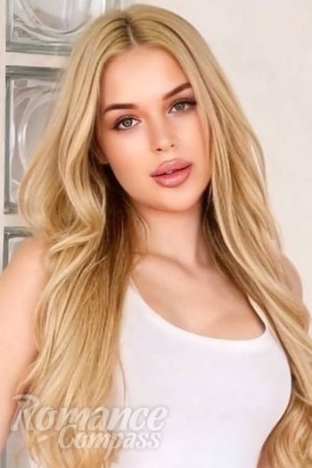 Ukrainian mail order bride Yeva from Kyiv with blonde hair and blue eye color - image 1