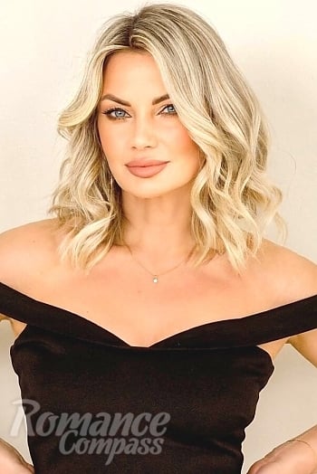 Ukrainian mail order bride Yana from Sumy with blonde hair and grey eye color - image 1
