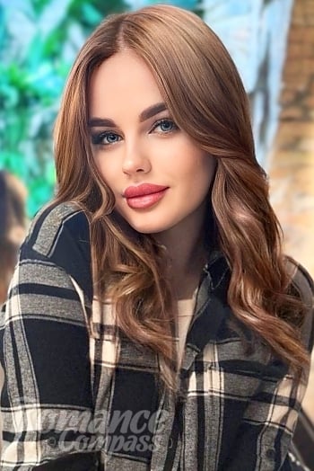 Ukrainian mail order bride Anastasiya from Kyiv with light brown hair and blue eye color - image 1