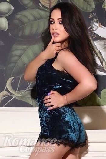 Ukrainian mail order bride Elena from Madrid with black hair and blue eye color - image 1