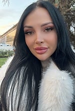 Ukrainian mail order bride Yuliya from Odesa with black hair and green eye color - image 4