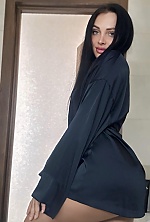 Ukrainian mail order bride Yuliya from Odesa with black hair and green eye color - image 3