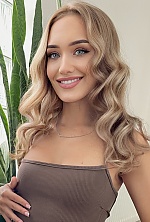 Ukrainian mail order bride Yana from Warsaw with blonde hair and blue eye color - image 21
