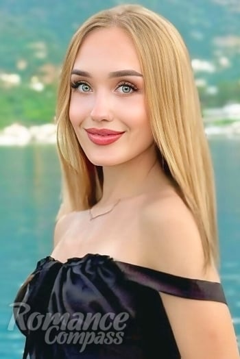 Ukrainian mail order bride Yana from Warsaw with blonde hair and blue eye color - image 1