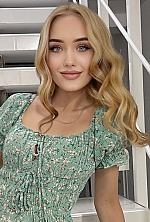 Ukrainian mail order bride Yana from Warsaw with blonde hair and blue eye color - image 45