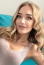 Ukrainian mail order bride Yana from Warsaw with blonde hair and blue eye color - image 36