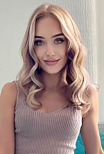 Ukrainian mail order bride Yana from Warsaw with blonde hair and blue eye color - image 34