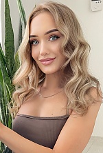 Ukrainian mail order bride Yana from Warsaw with blonde hair and blue eye color - image 23