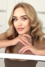 Ukrainian mail order bride Yana from Warsaw with blonde hair and blue eye color - image 24