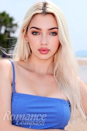 Ukrainian mail order bride Oleksandra from Ternopil with blonde hair and blue eye color - image 1