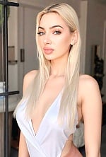 Ukrainian mail order bride Oleksandra from Ternopil with blonde hair and blue eye color - image 7