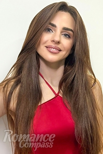 Ukrainian mail order bride Olesya from Kyiv with light brown hair and blue eye color - image 1