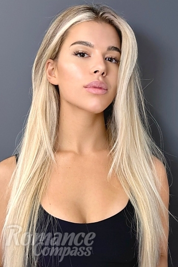 Ukrainian mail order bride Lina from Chisinau with blonde hair and blue eye color - image 1