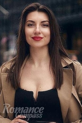 Ukrainian mail order bride Irina from Toronto with auburn hair and brown eye color - image 1