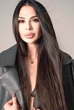 Ukrainian mail order bride Ruslana from Kyiv with black hair and brown eye color - image 7