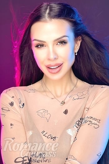 Ukrainian mail order bride Ruslana from Kyiv with black hair and brown eye color - image 1
