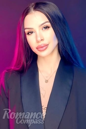 Ukrainian mail order bride Ruslana from Kyiv with black hair and brown eye color - image 1