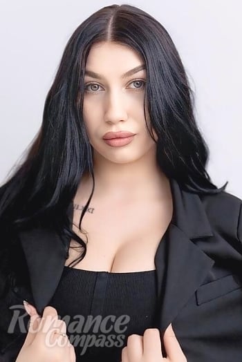 Ukrainian mail order bride Daryna from Zhytomyr with black hair and green eye color - image 1