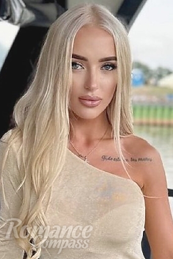 Ukrainian mail order bride Polina from Berlin with blonde hair and blue eye color - image 1