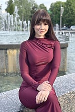 Ukrainian mail order bride Diana from Kyiv with black hair and green eye color - image 3