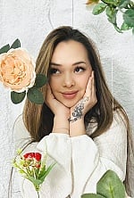 Ukrainian mail order bride Laura from Almaty with light brown hair and brown eye color - image 4