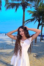 Ukrainian mail order bride Kamila from Madrid with light brown hair and green eye color - image 5