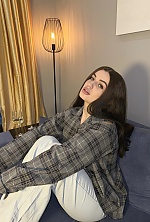 Ukrainian mail order bride Anastasia from Kiyiv with black hair and blue eye color - image 6