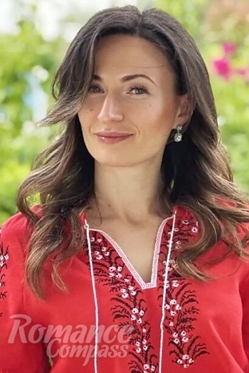 Ukrainian mail order bride Irina from Prague with light brown hair and green eye color - image 1