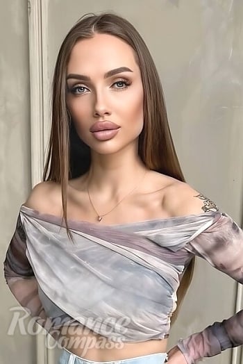 Ukrainian mail order bride Julia from Brussels with light brown hair and grey eye color - image 1