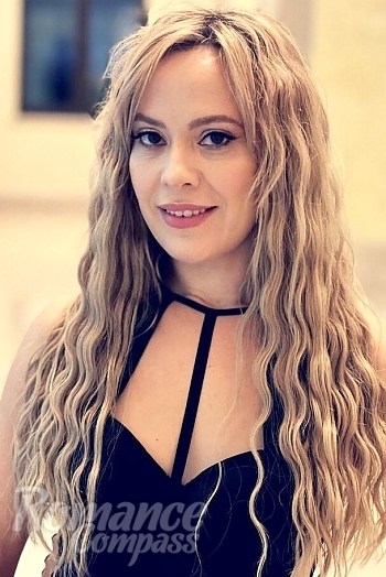 Ukrainian mail order bride Olga from London with blonde hair and brown eye color - image 1