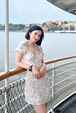 Ukrainian mail order bride Oksana from Lviv with black hair and blue eye color - image 9