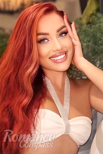 Ukrainian mail order bride Ana from Chisinau with red hair and blue eye color - image 1