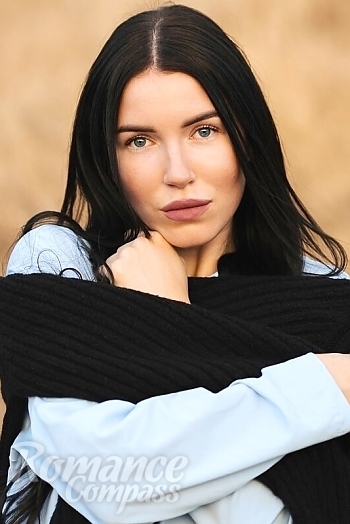 Ukrainian mail order bride Tatyana from Poltava with black hair and brown eye color - image 1
