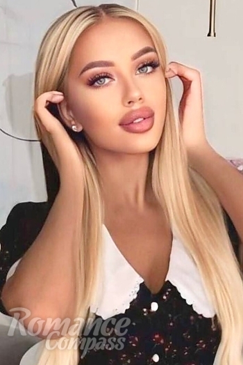 Ukrainian mail order bride Olha from Kyiv with blonde hair and green eye color - image 1