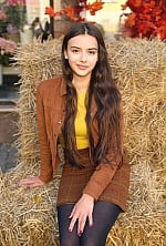 Ukrainian mail order bride Khrystyna from Ivano-Frankivsk with brunette hair and brown eye color - image 12