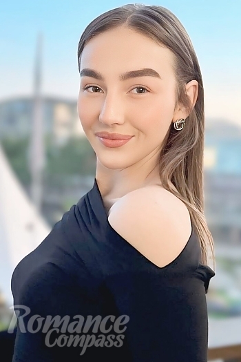 Ukrainian mail order bride Olexandra from Kropyvnytskyi with light brown hair and green eye color - image 1