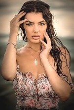 Ukrainian mail order bride Victoria from Odesa with black hair and green eye color - image 11