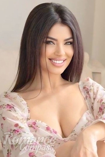Ukrainian mail order bride Victoria from Odesa with black hair and green eye color - image 1