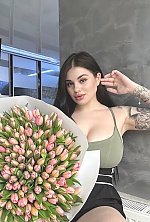 Ukrainian mail order bride Polina from Kyiv with black hair and green eye color - image 6