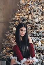 Ukrainian mail order bride Polina from Kyiv with black hair and green eye color - image 2