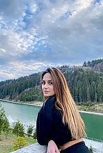 Ukrainian mail order bride Oksana from Lviv with light brown hair and green eye color - image 2