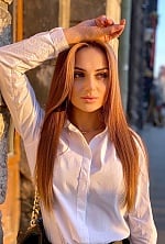 Ukrainian mail order bride Oksana from Lviv with light brown hair and green eye color - image 6