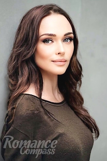 Ukrainian mail order bride Elina from Kyiv with light brown hair and brown eye color - image 1