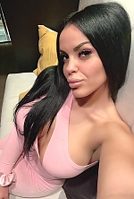 Ukrainian mail order bride Anna from Belgrade with black hair and green eye color - image 2