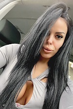 Ukrainian mail order bride Anna from Belgrade with black hair and green eye color - image 4