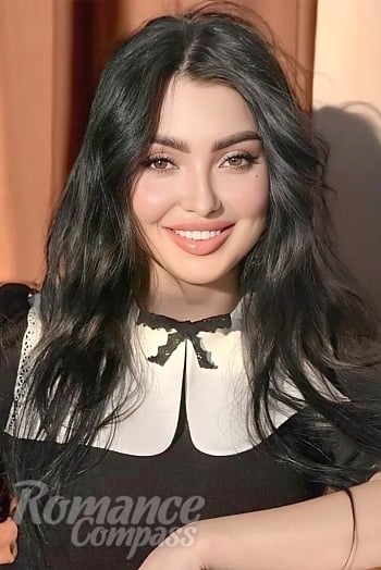 Ukrainian mail order bride Anna from Kryvyi Rih with black hair and black eye color - image 1