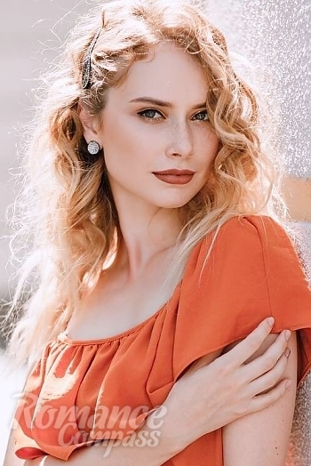 Ukrainian mail order bride Iryna from Poltava with blonde hair and blue eye color - image 1