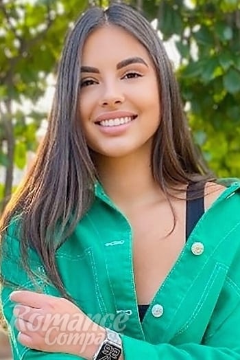 Ukrainian mail order bride Amina from Odesa with light brown hair and brown eye color - image 1