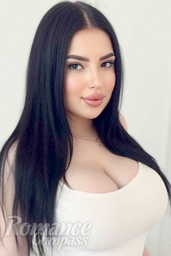 Ukrainian mail order bride Daria from Warsaw with black hair and blue eye color - image 1