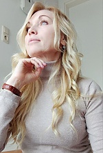 Ukrainian mail order bride Olga from Kyiv with blonde hair and blue eye color - image 13